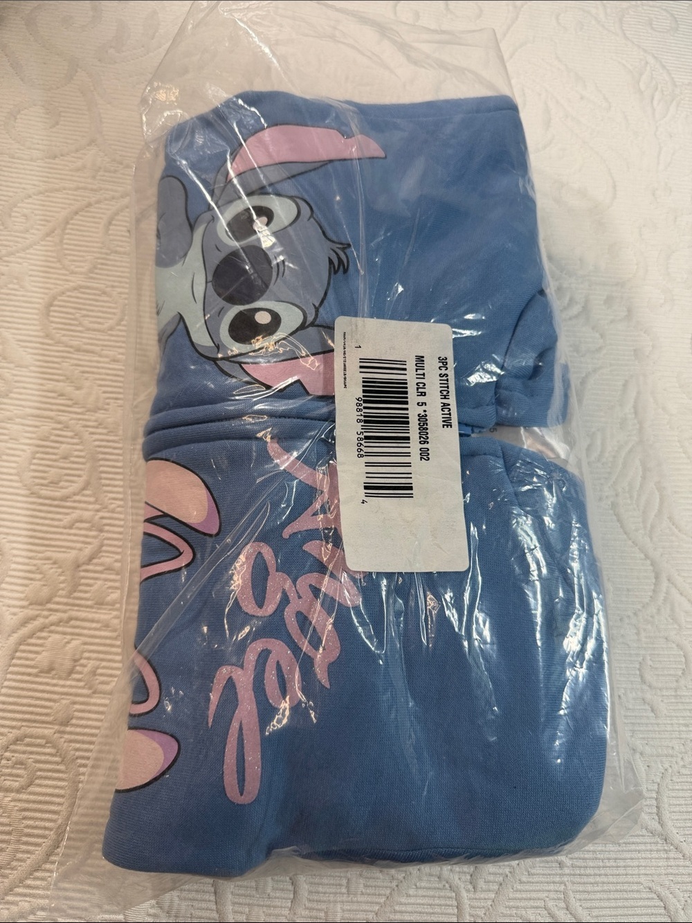 Disney Stitch 3 Piece Track suit. NWT Size 5. Shorts, Tee, and Jacket.